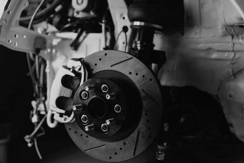 Drilled brake disc and calliper in the wheel arch